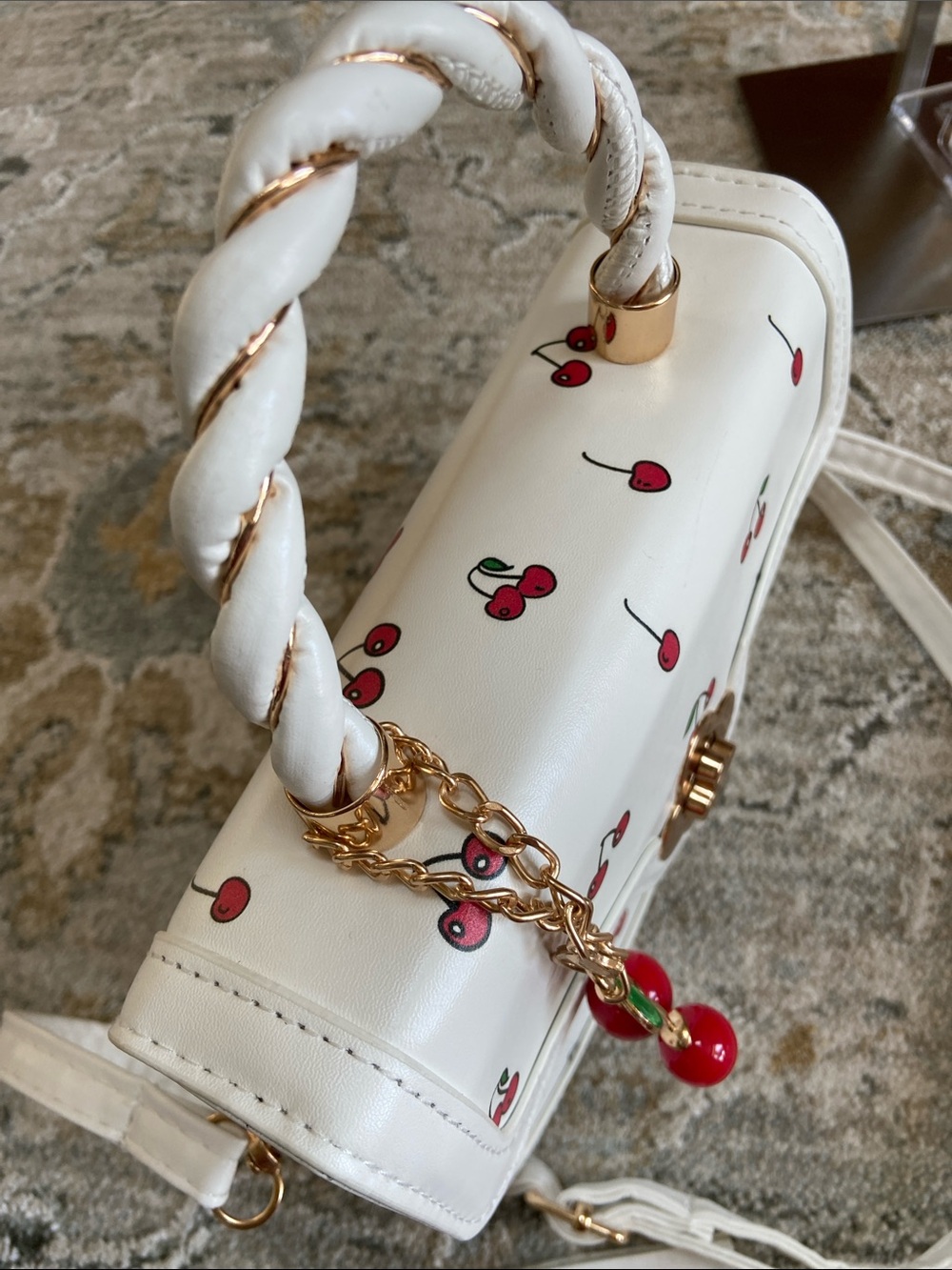 White Cherry Print Mini Crossbody Bag with Top Handle and Turn Lock Hardware - Picture 7 of 12
